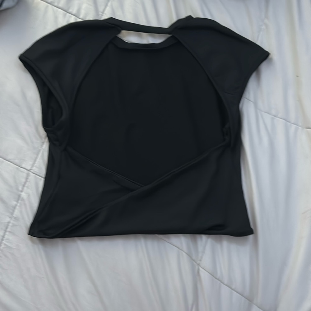 Open back top. Not too short only worn once no rips or stains